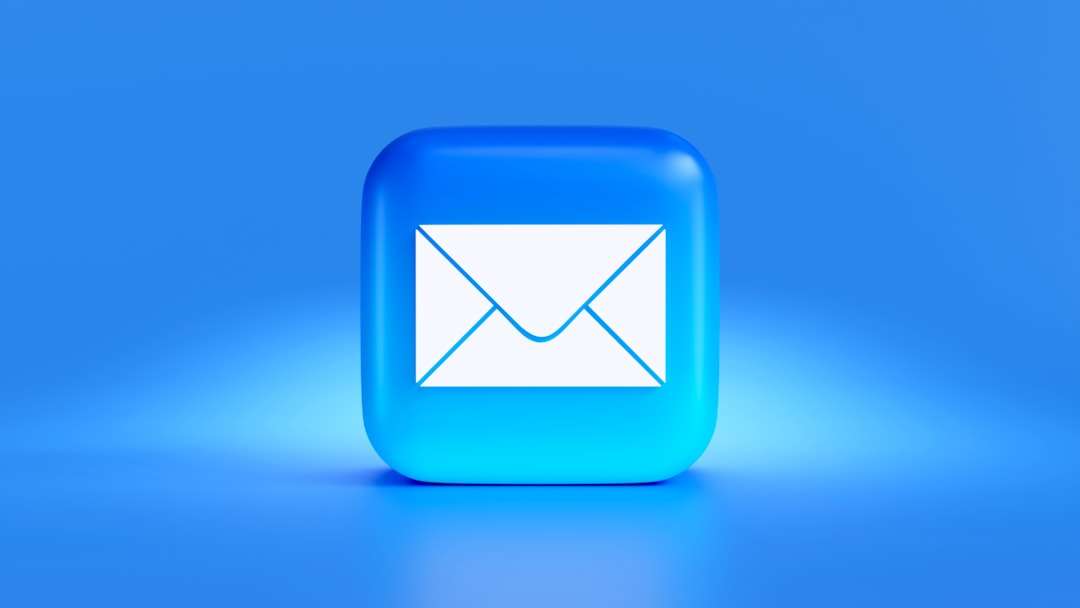 a blue button with a white envelope on it kajabi sales funnels email marketing automation tools
