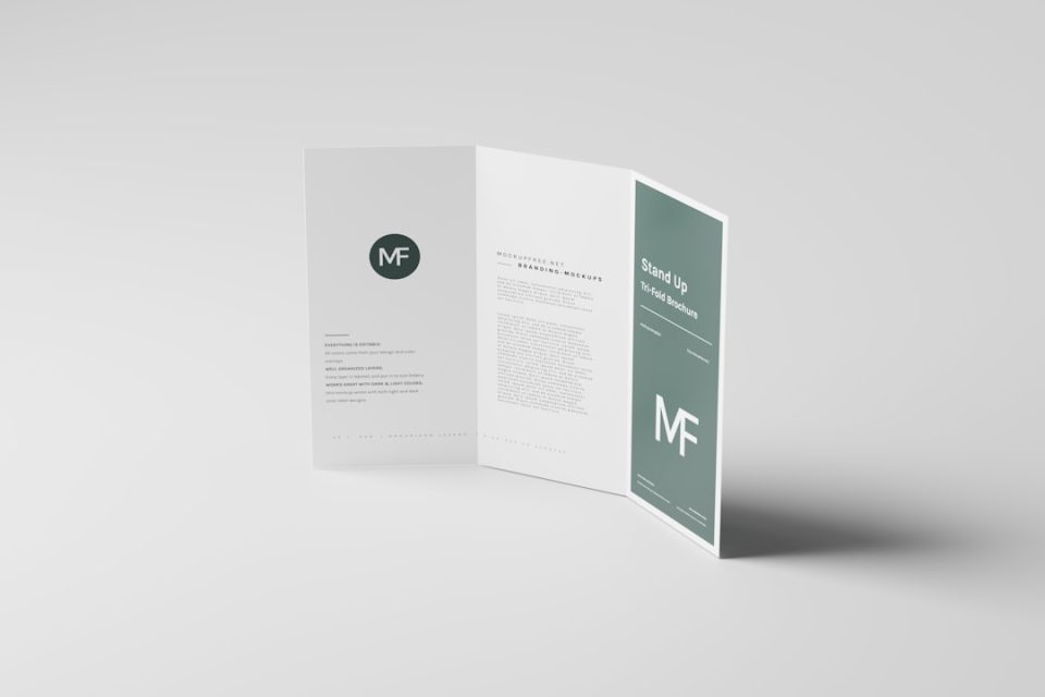 a folded brochure on a white background branding tools, pdf download, ai logo design