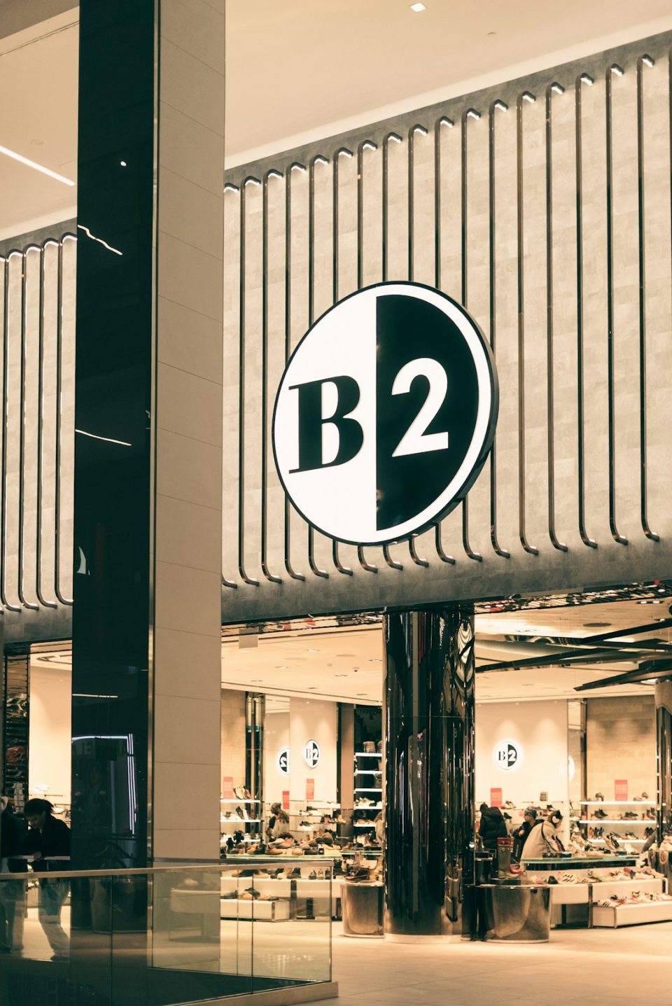Modern storefront with b2 logo and interior view b2b marketing funnel, creator partnership, lead generation