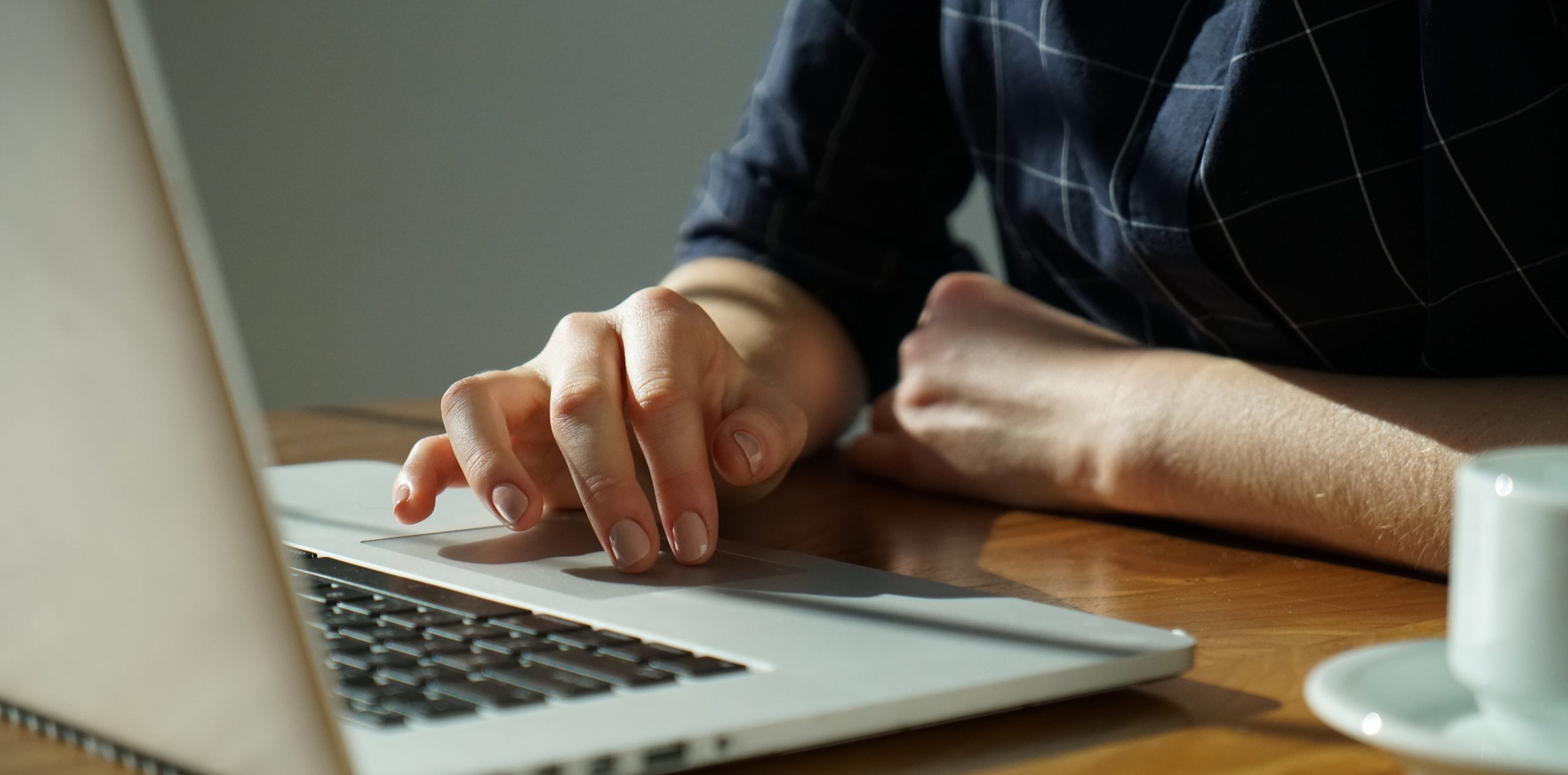 Person typing on a laptop