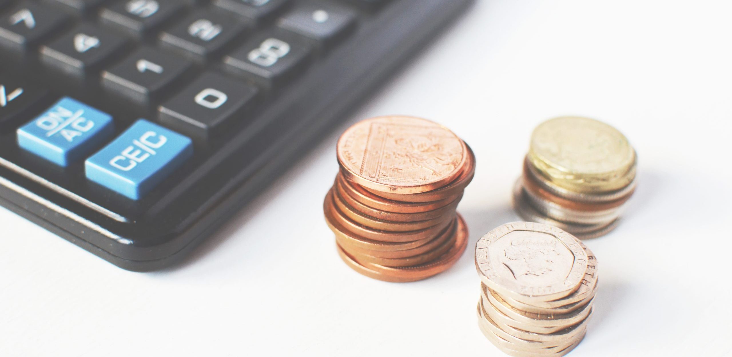 Calculator and coins 