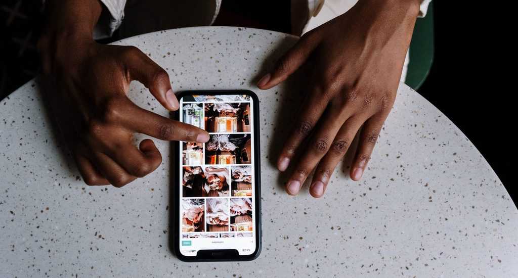 Person holding white samsung galaxy smartphone