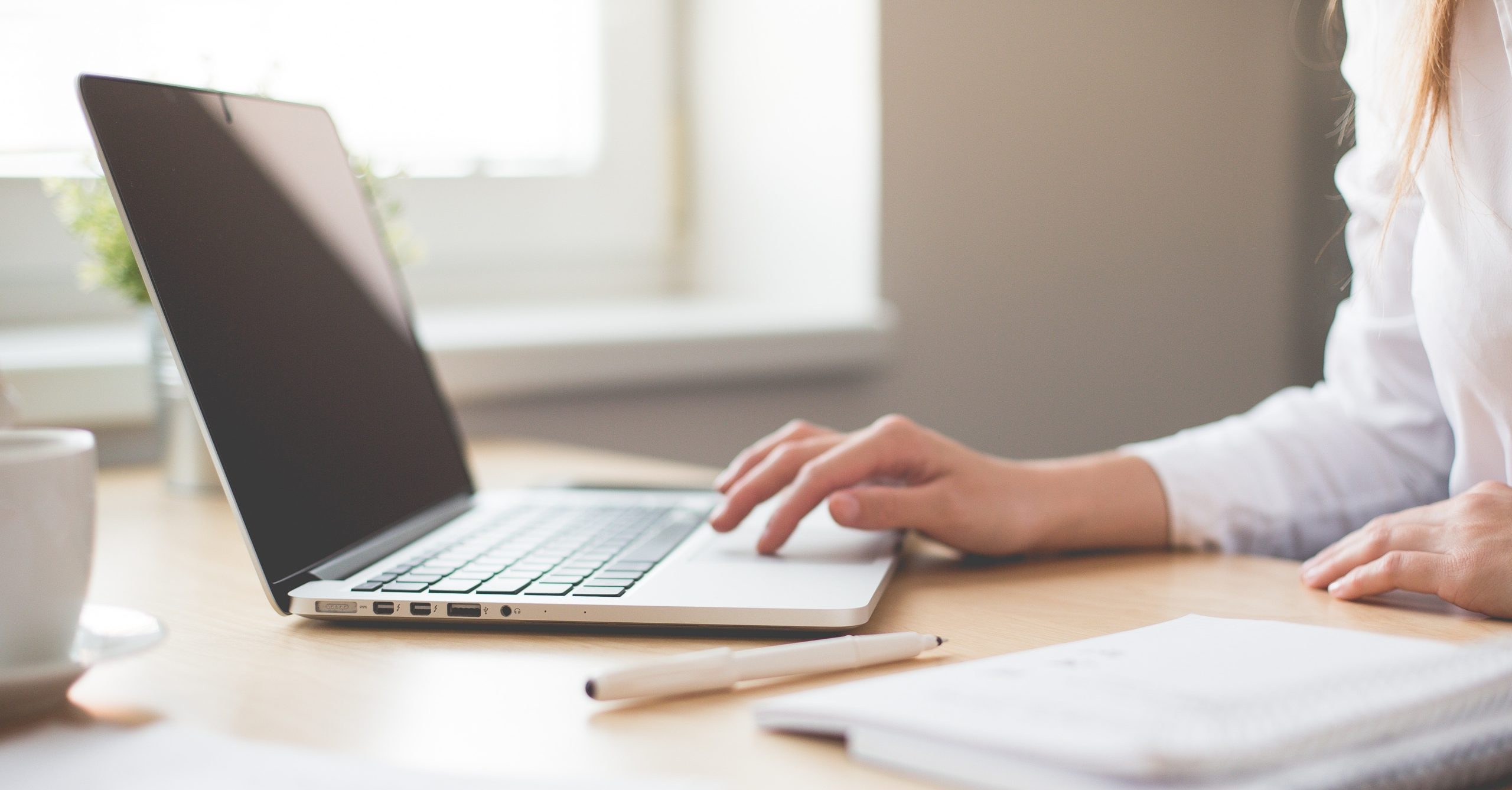 Woman Using Laptop