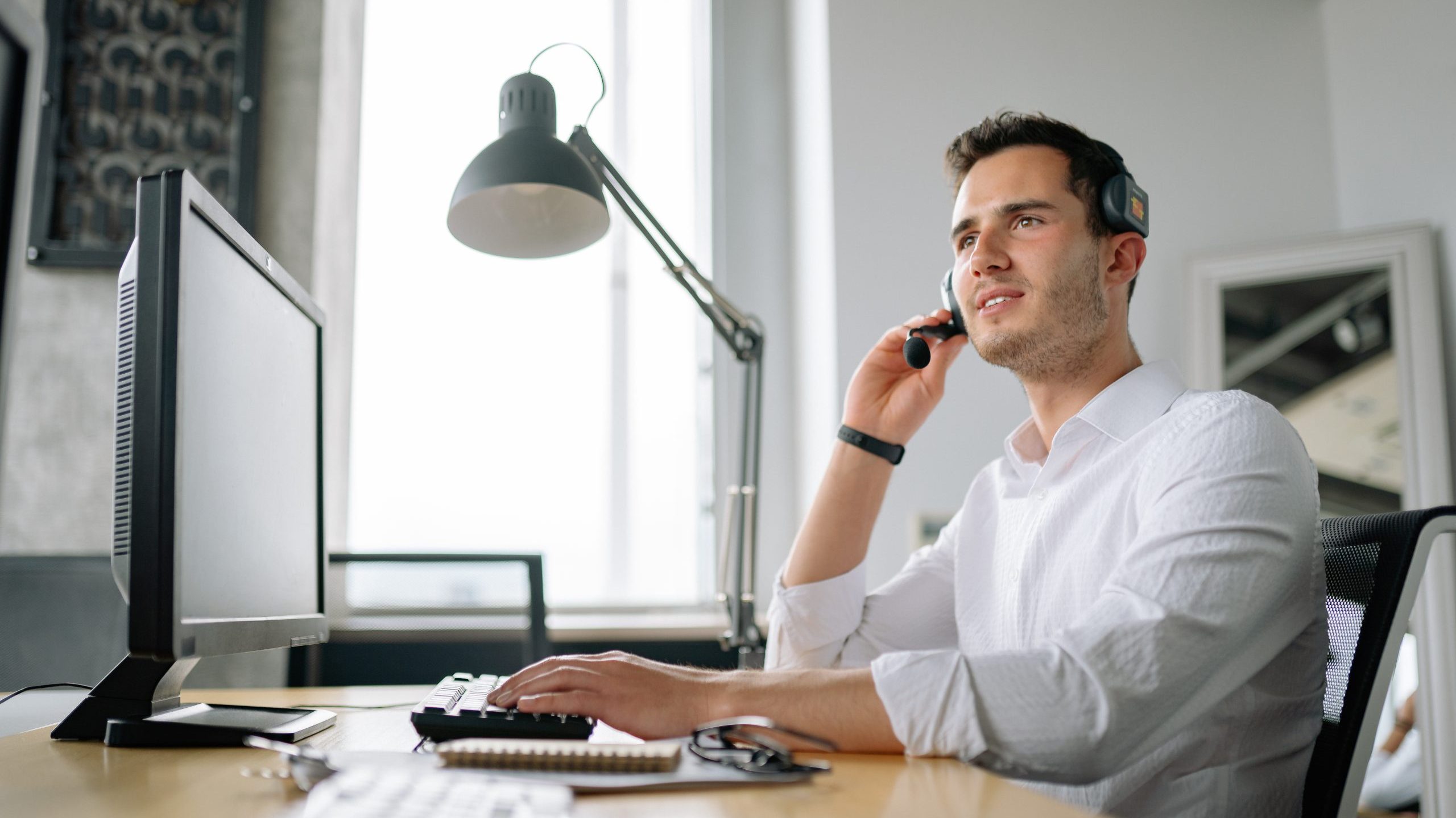 A man working in a call center