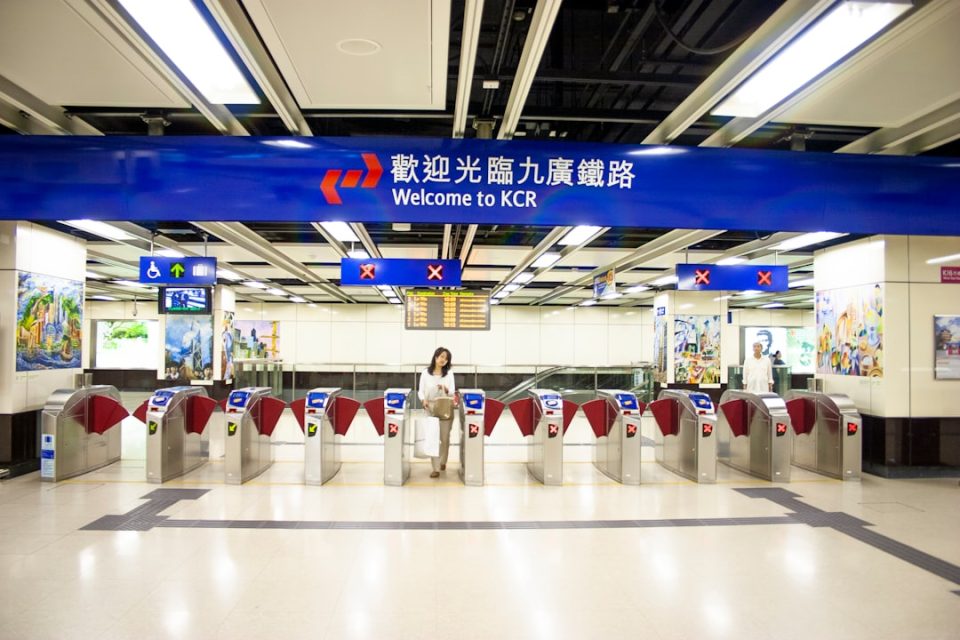 people in white uniform standing on white floor tiles airport travel china, smartphone preparation, travel checklist