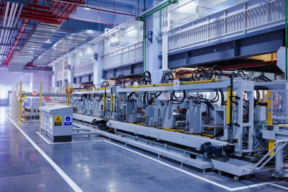 a large machine in a large building pcb assembly line, robotic machines, circuit boards