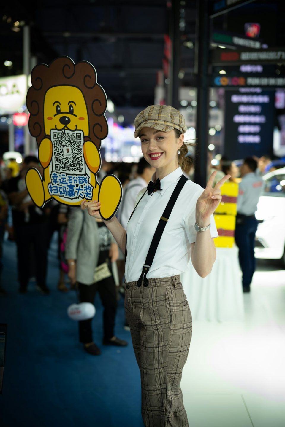 Woman in vintage clothes holds lion sign with qr code qr code design examples, branded qr code, marketing materials with qr