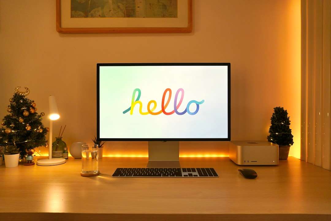 a desktop computer sitting on top of a wooden desk happy designer, colorful design workspace, fun creativity