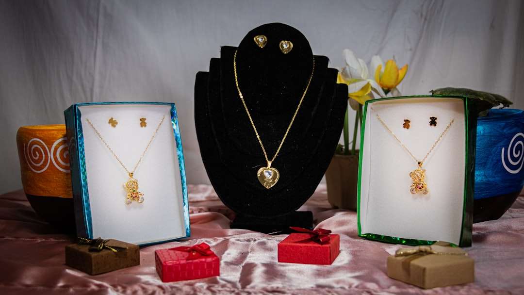 a display of jewelry on a table handmade jewelry, product photography, online store