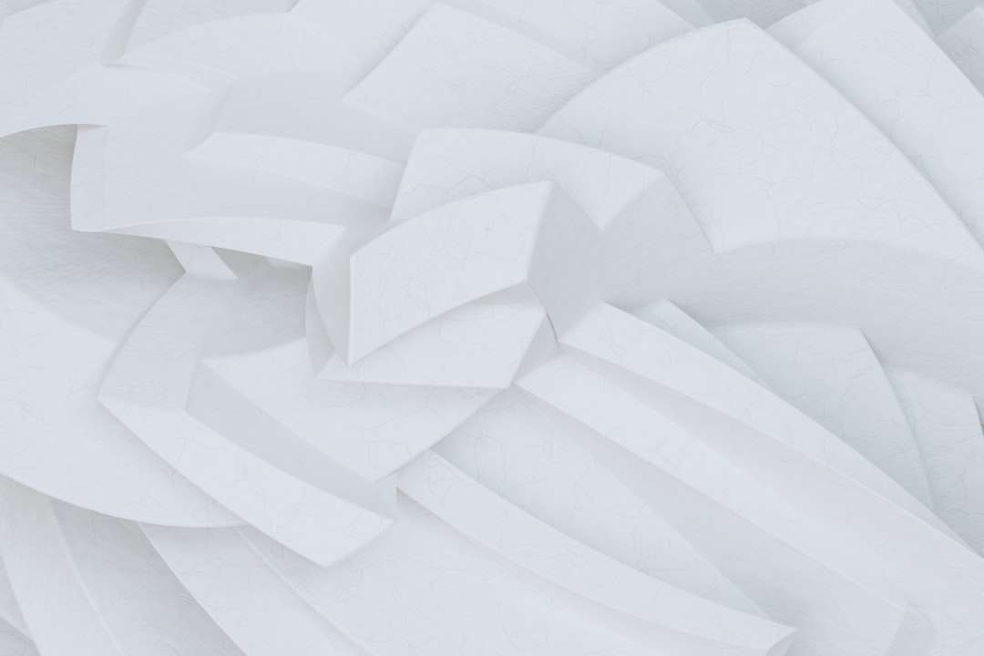 a close up of a white sculpture made of paper salesforce files structure, content document, content version, contentdocumentlink