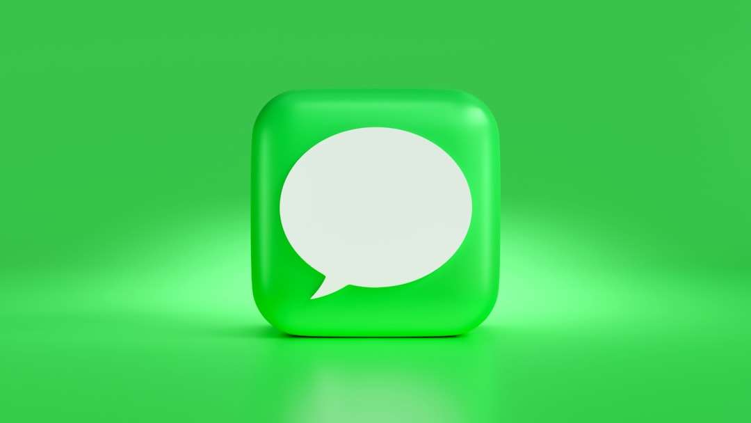 a green square with a white speech bubble outlook interface, email templates, business communication