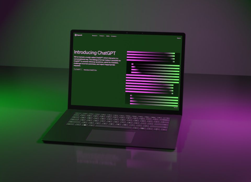 a laptop computer sitting on top of a table logo design interface laptop screen, color palette options, typography selection panel