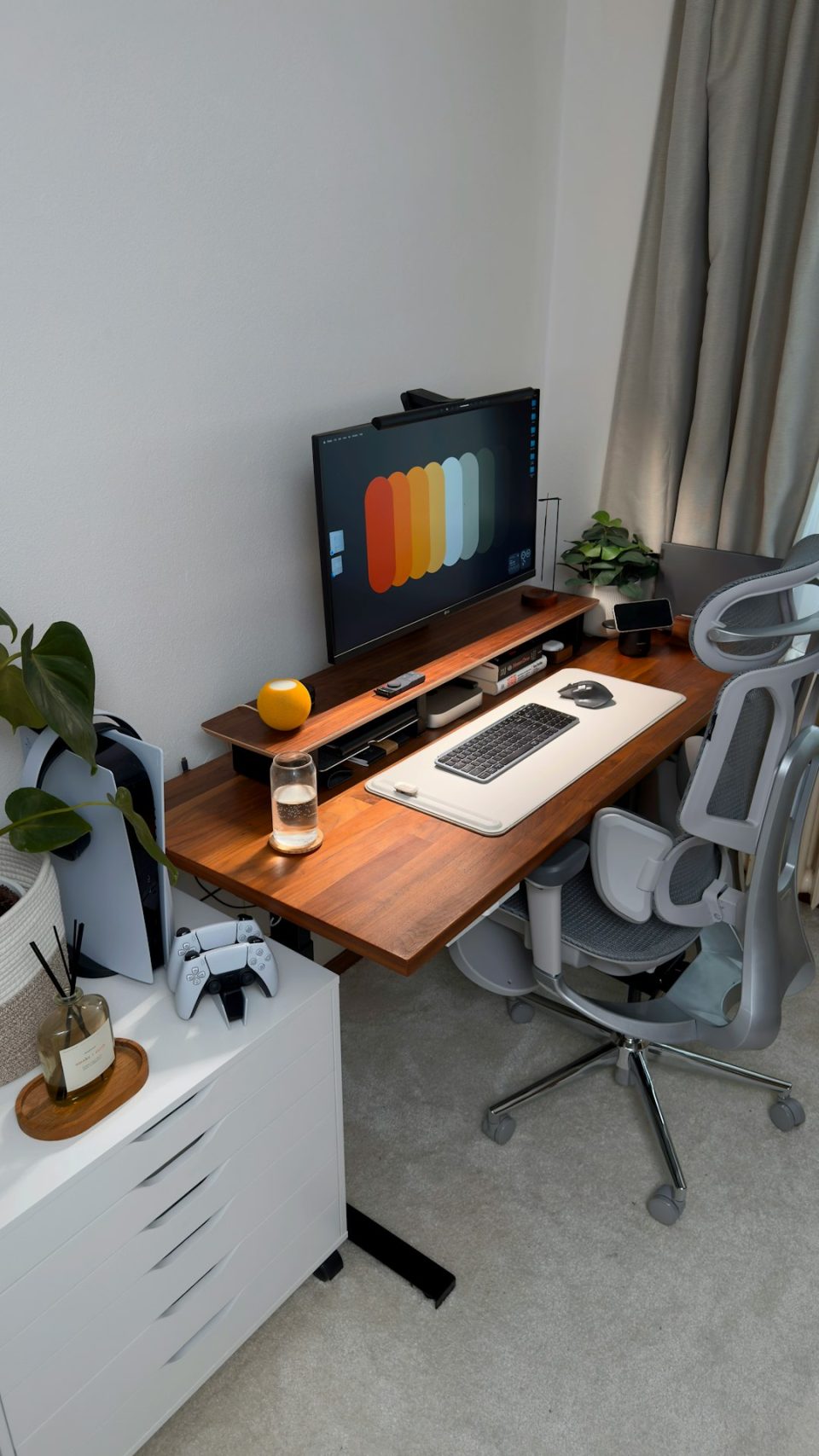 A modern desk setup with computer and gaming accessories. modern workspace computer screen flowchart interface minimal design